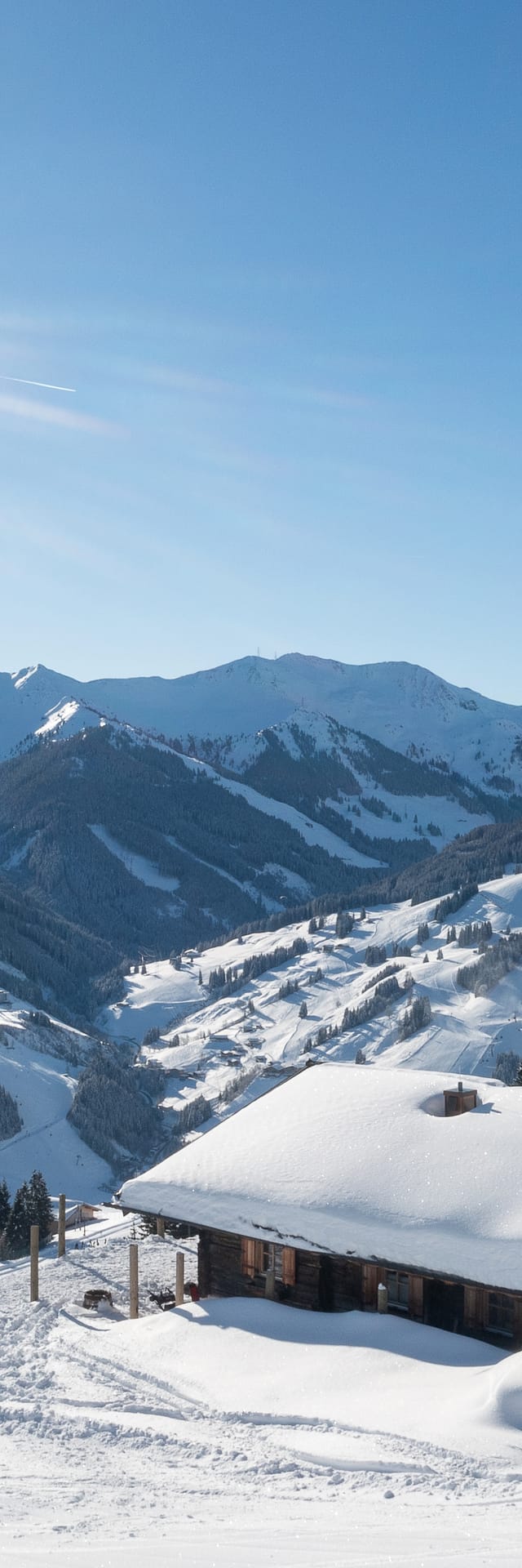 The Bachalm exterior in winter, with snow and sunshine.