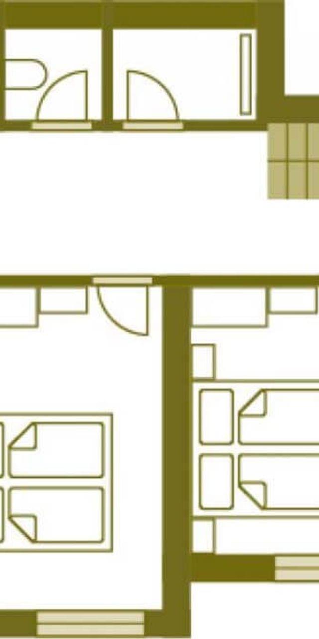 Floor plan with four twin bedrooms, shared bathrooms, and central hallway